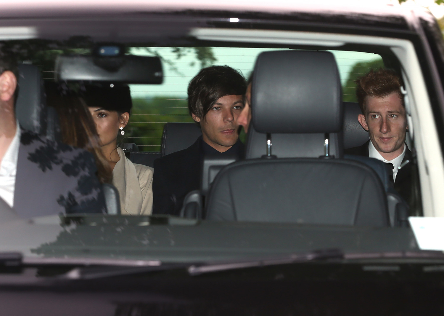 Louis Tomlinson from One Direction and Serge from Kasabian arrive at Peckforton Castle for Jamie Vardy's wedding to Beck Nicholson 25 May 2016.