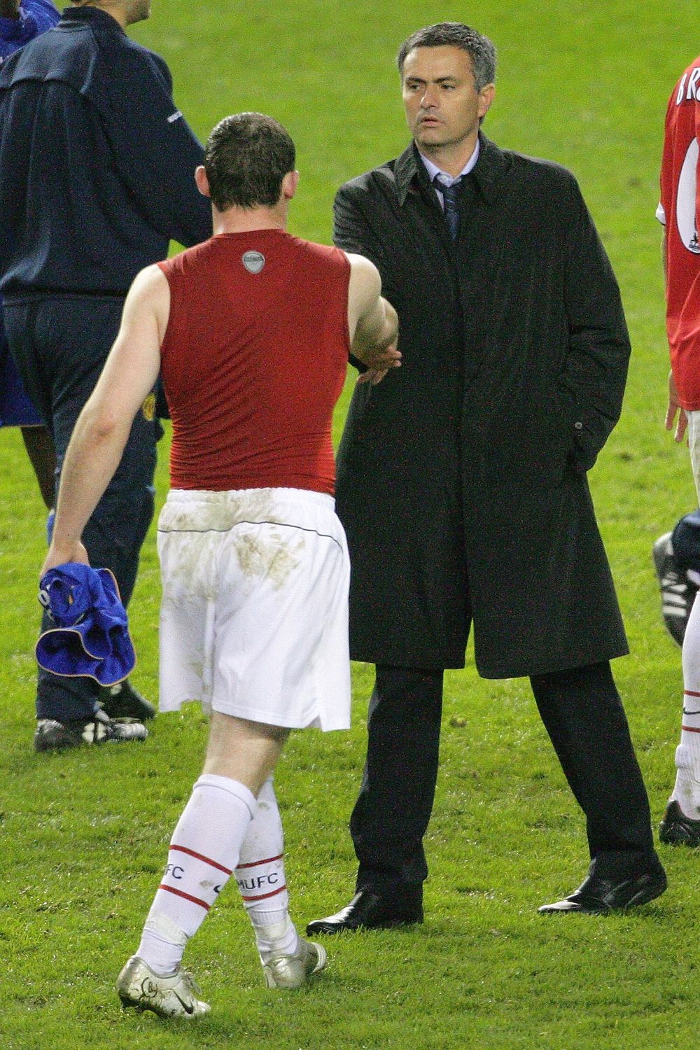 Mourinho shakes hands with Wayne Rooney who will now be his captain at Man Utd