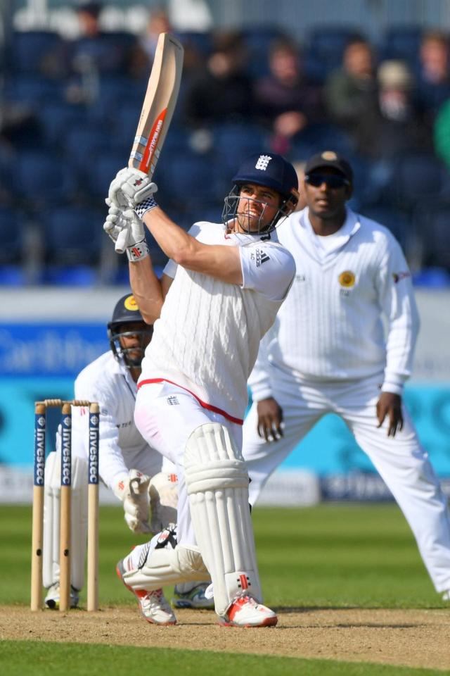  Alastair Cook hits the ball to the boundary for England