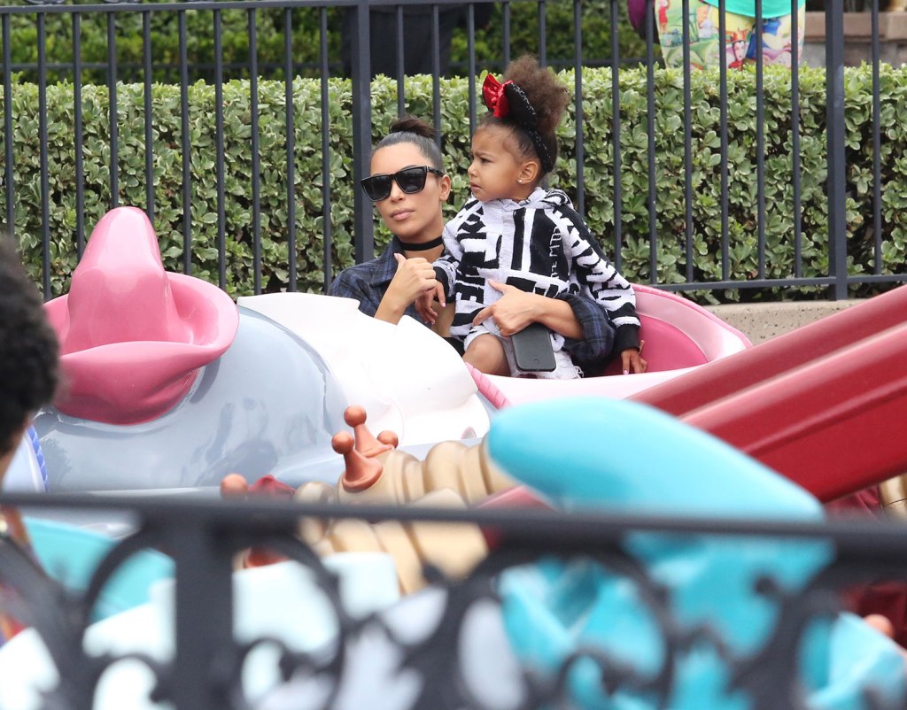  North sported some sequinned Minnie Mouse ears for the day out with her mum who just flew back from Cannes