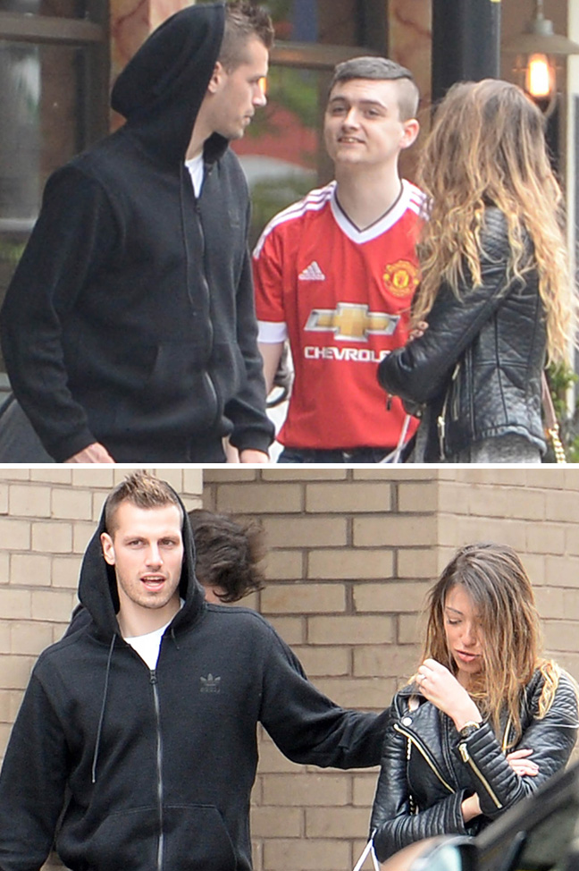  Morgan Schneiderlin and fiancee Camille Sold take a stroll through Manchester city centre together