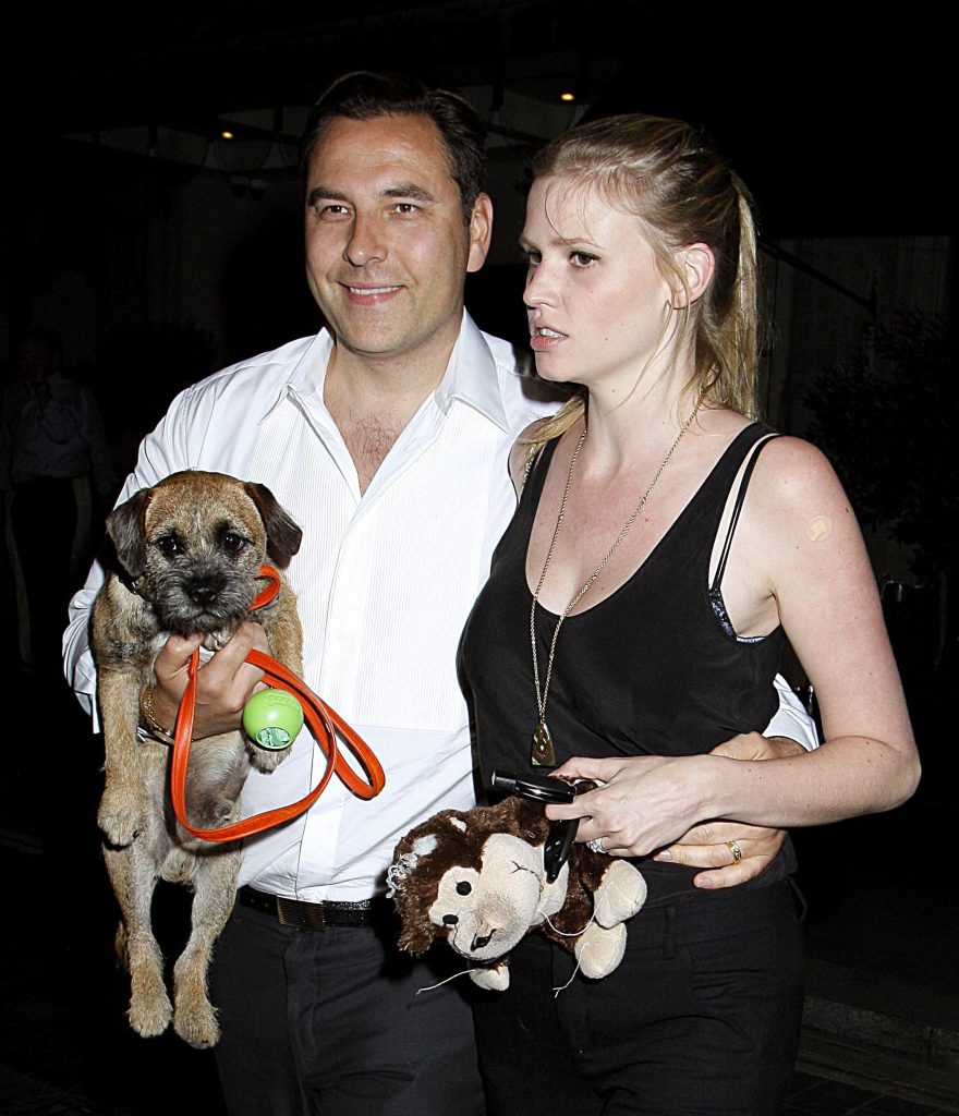  Happier times . . . David and Lara with their little pup