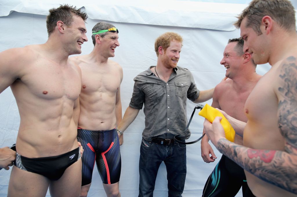 The Prince joined the British swimming relay team after they won gold in the finals on day three