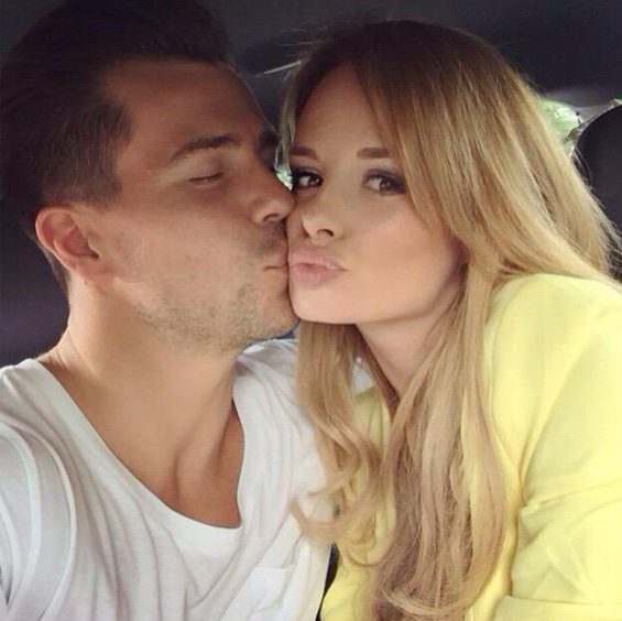  Pucker up . . . Rhian with her hunky fiancé Oliver Mellor