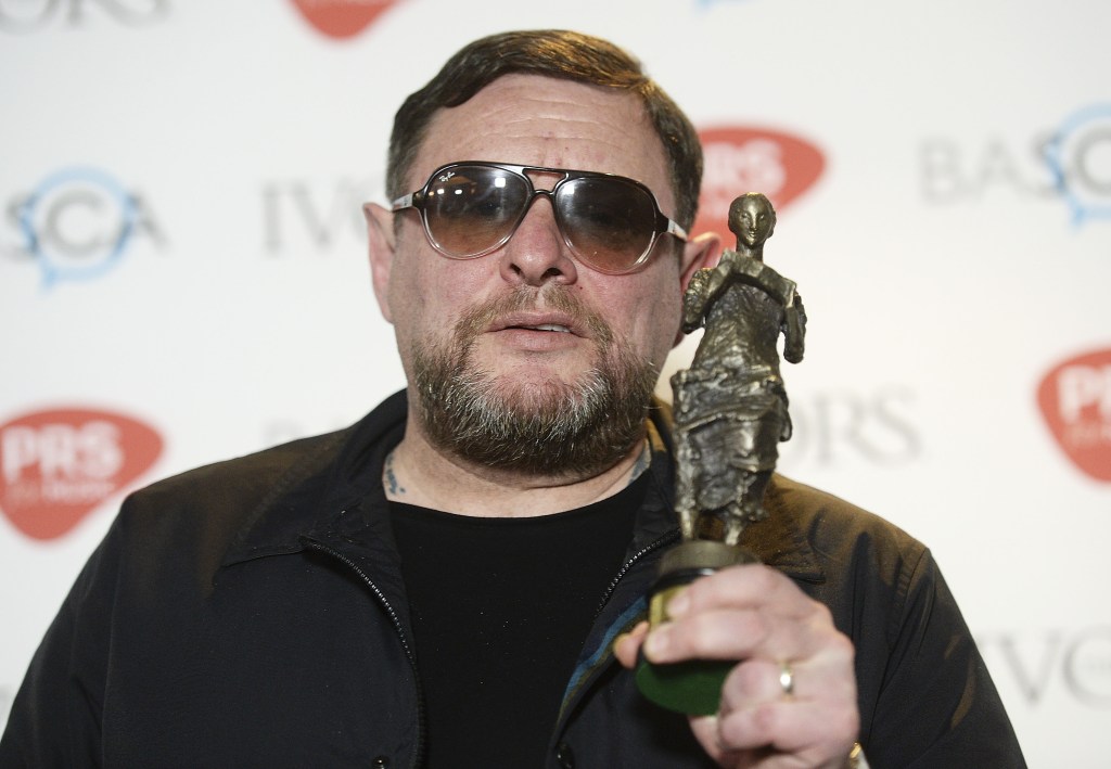  Shaun poses with the Happy' Mondays Inspiration gong at last night's Ivor Novello Awards