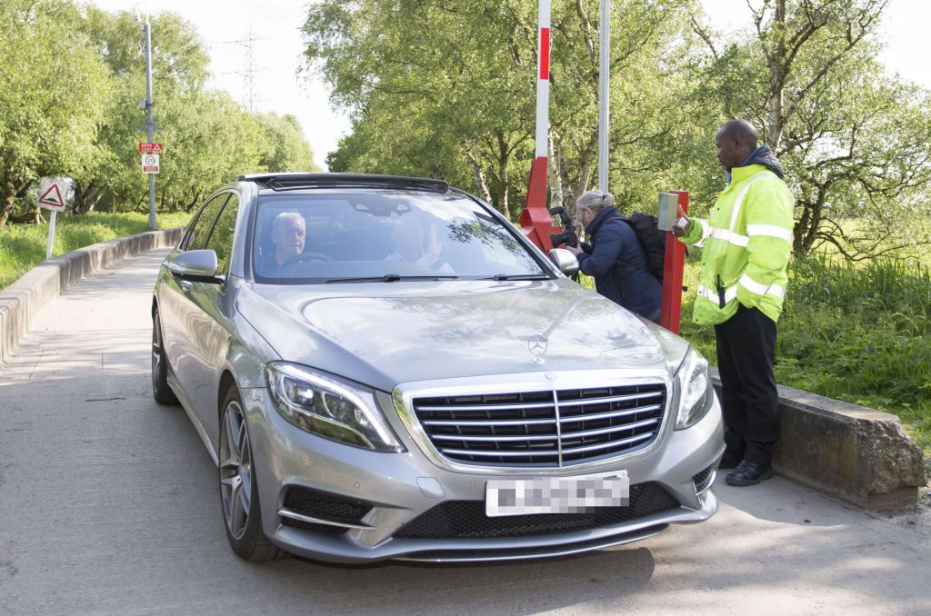  Louis Van Gaal leaves Manchester United's Carrington complex on Monday having been relieved of his duties