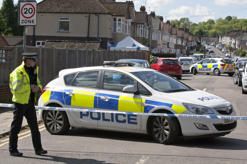  Sealed off . . . cops at scene of killing