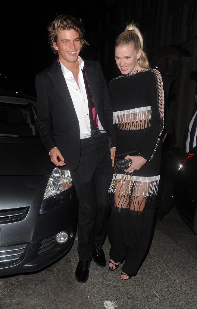  Fringe appeal . . . Lara Stone leaves club hand-in-hand with Aussie model Jordan Barrett