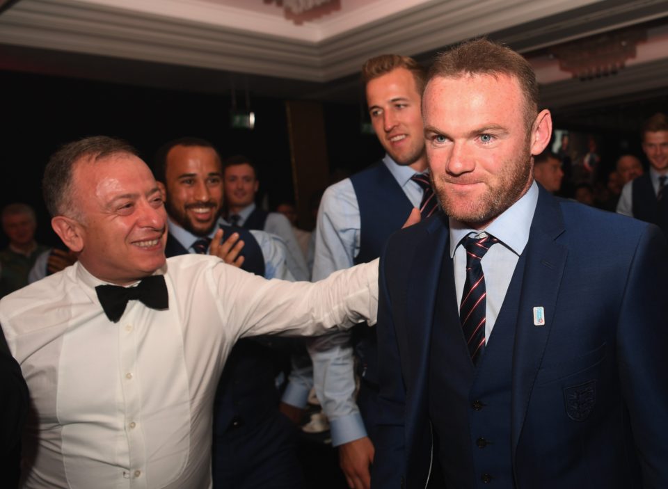  Rooney ... heads to the stage to perform during the England Footballers Foundation charity event at Sopwell House