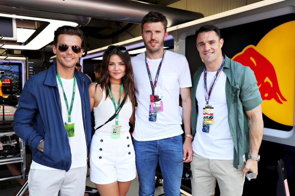 Lewis Hamilton's win was watched by Louis Tomlinson (left), Michael Carrick (centre) and Dan Carter (right) 