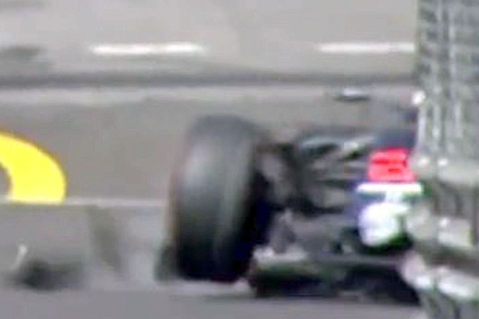  Chunk of loose metal narrowly missed Jenson Button's McLaren cockpit