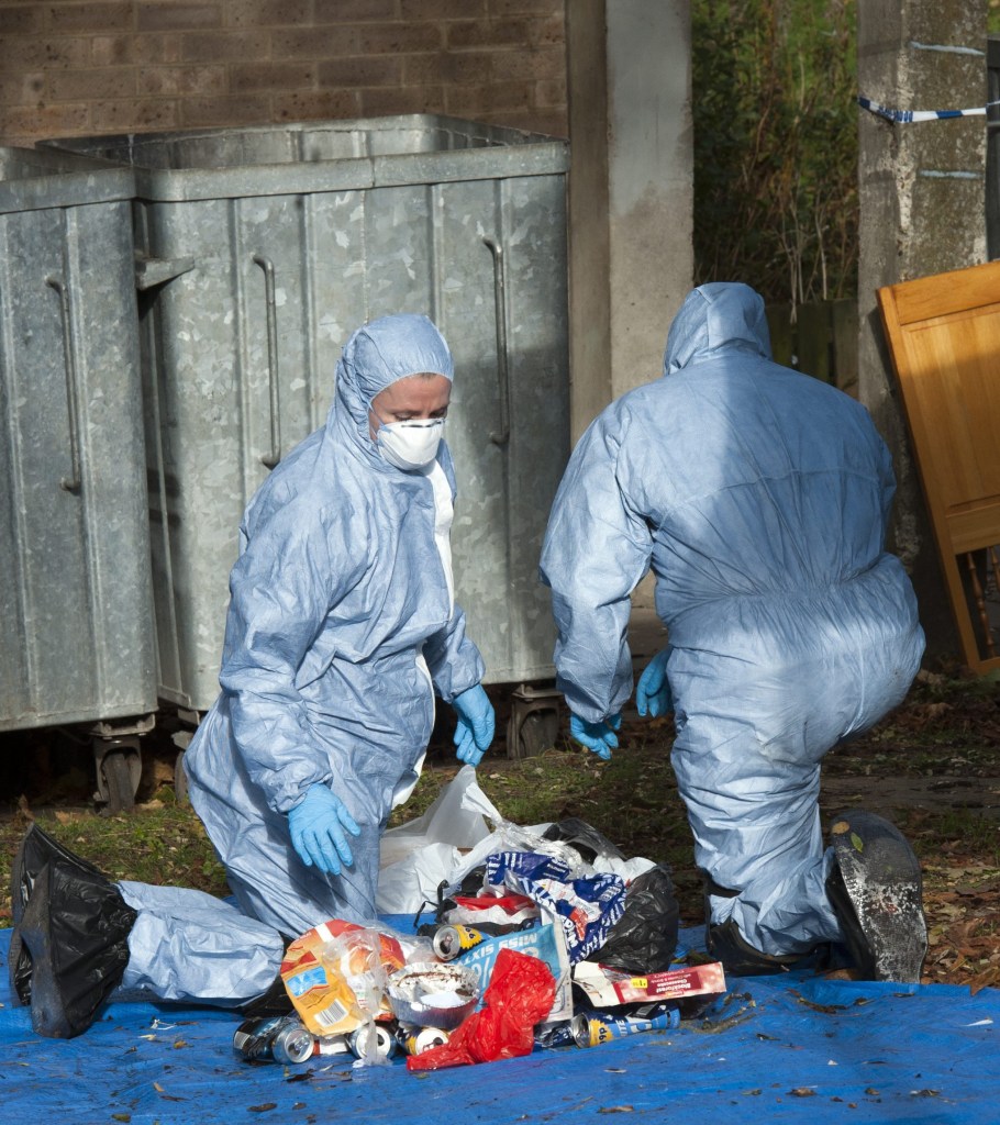  Forensic police officers search bins at Shanklin Estate, Croydon,London after Ellie died