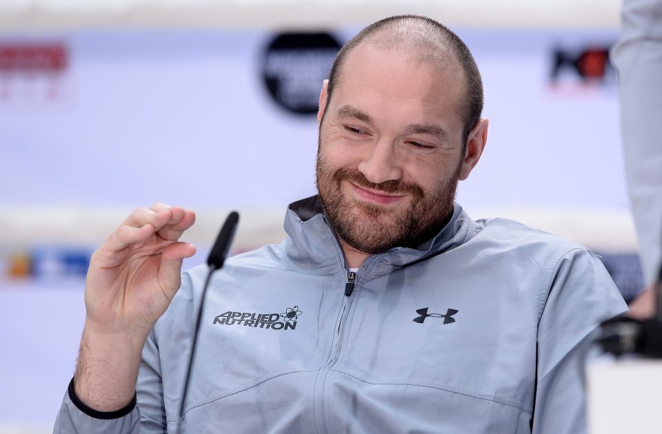  Tyson Fury jokes during his promotional press conference in Cologne