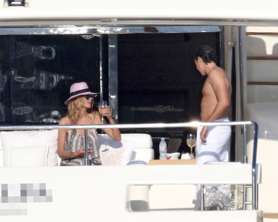 The couple return to their swanky yacht to catch some more rays