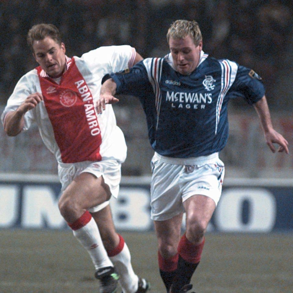  Frank de Boer clashes with Paul Gascoigne during an  Ajax and Rangers clash