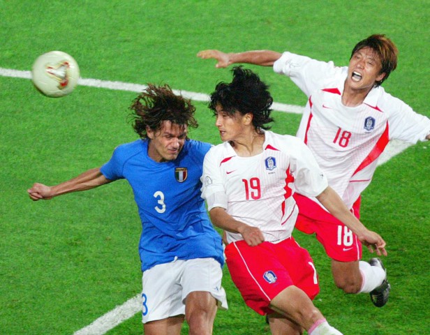  Paolo Maldini is beaten to a header by Ahn Jung-Hwan as Italy crash out in 2002