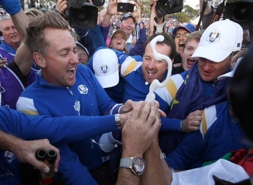  Fan frenzy at the 2014 Ryder Cup at Gleneagles...autograph hunters besiege Poults