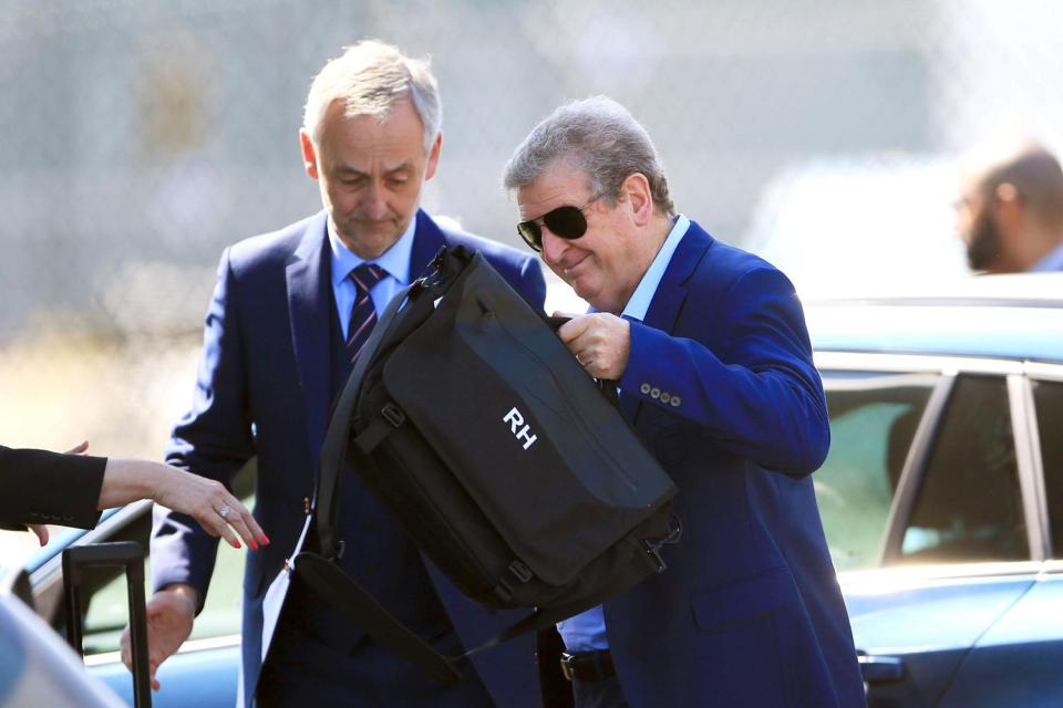  England boss Roy Hodgson turned up looking confused with his customised bag