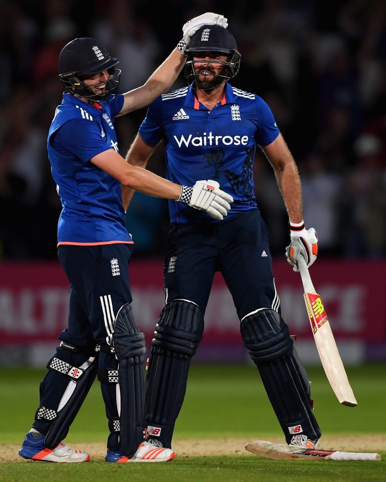  Chris Woakes and last-ball six-hitter Liam Plunkett celebrate England sealing a tie