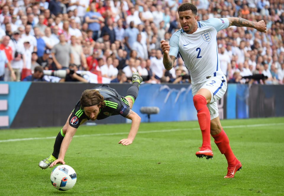  Kyle Walker fouls  Joe Allen as he shows his extreme energy from right-back