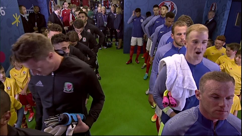  Joe Hart lines up in the tunnel behind England captain Wayne Rooney