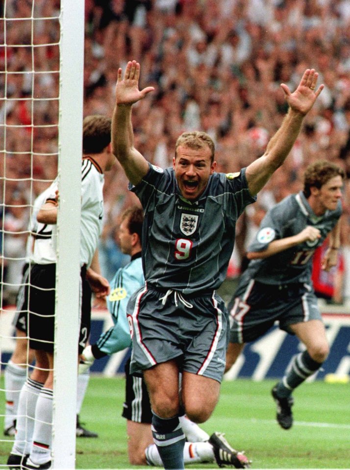  Alan Shearer celebrates after his second minute goal for England