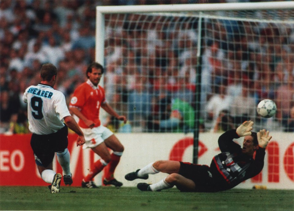  Alan Shearer smashes a goal pasta Edwin van der Sar at Euro 96