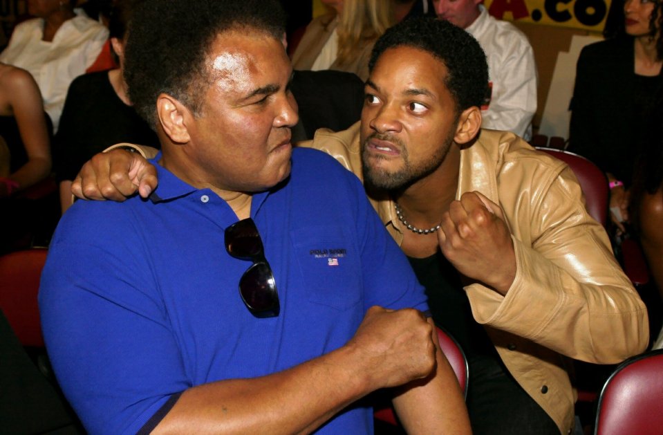  The late boxing legend Muhammad Ali jokes with actor Will Smith prior to watching daughter Laila Ali's fight against Marjorie Jones in June 2000