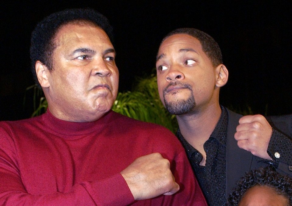  Muhammad Ali and Will Smith pose at the premiere of acclaimed film Ali in 2001