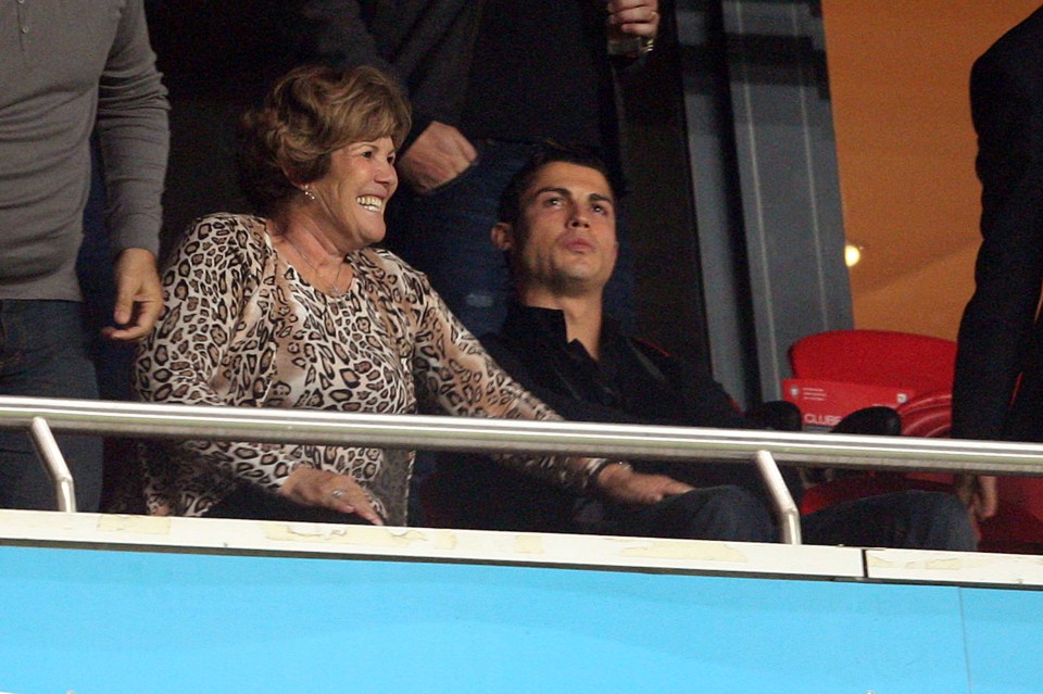  Portugal's Cristiano Ronaldo sits in the stand with his mother