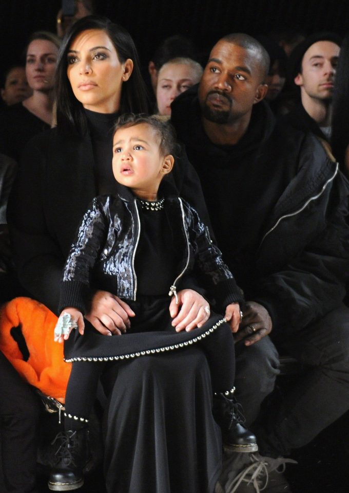  While the adorable tot is the perfect mix of his famous mother and rapper father Kanye West (pictured with Kim and North) , Kim claimed she thought her youngest child looked more like her