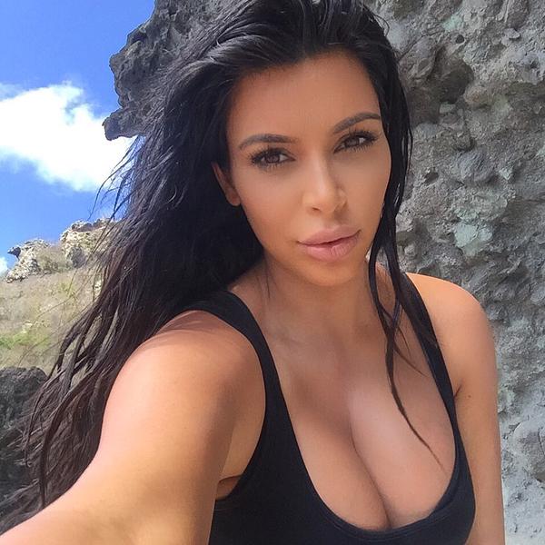  Fans were confused as to why Kim hadn't included her actual face in the corseted selfie