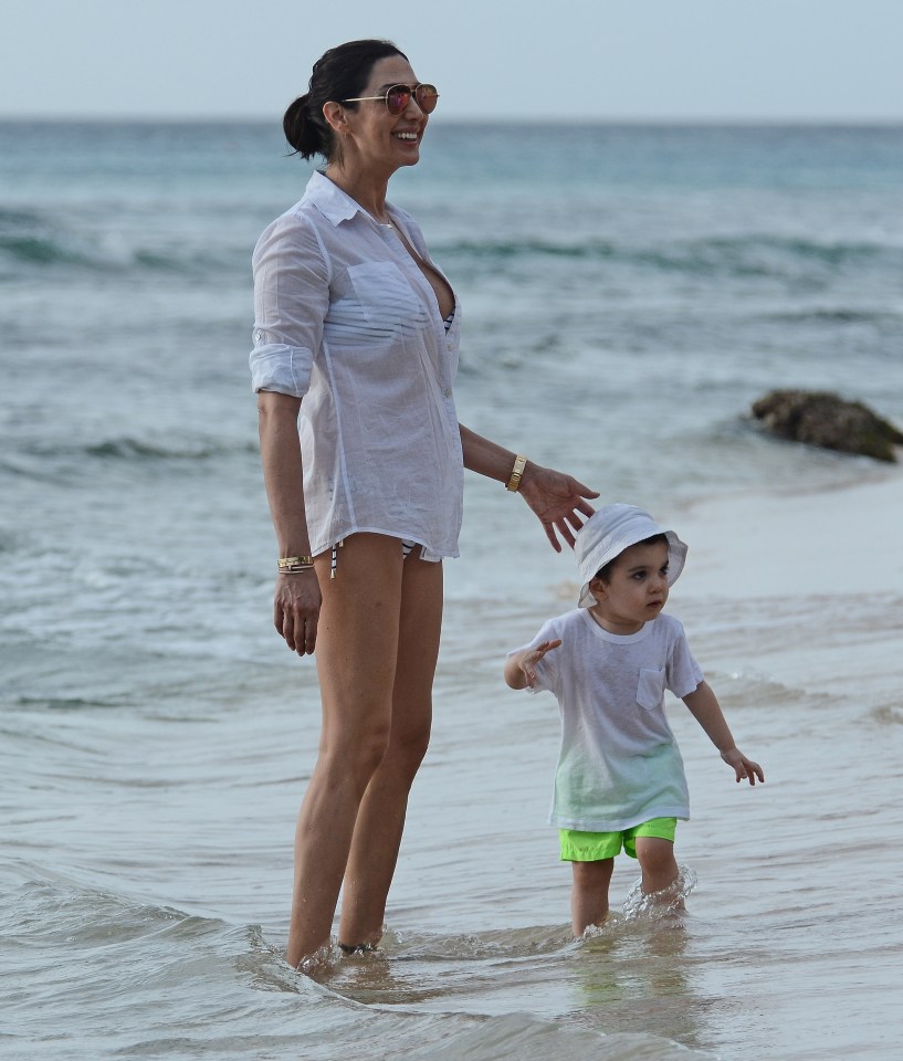  Lauren takes her keen swimmer son for a dip in the sea