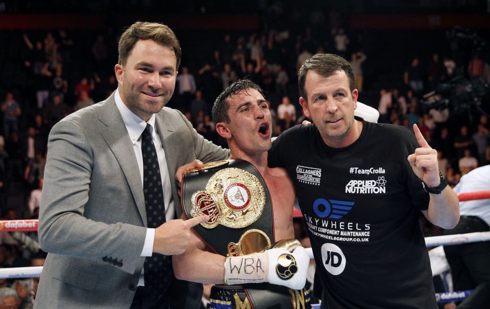  Anthony Crolla celebrates with promoter Eddie Hearn and trainer Joe Gallagher after beating Ismael Barroso back in May in the first defence of his title