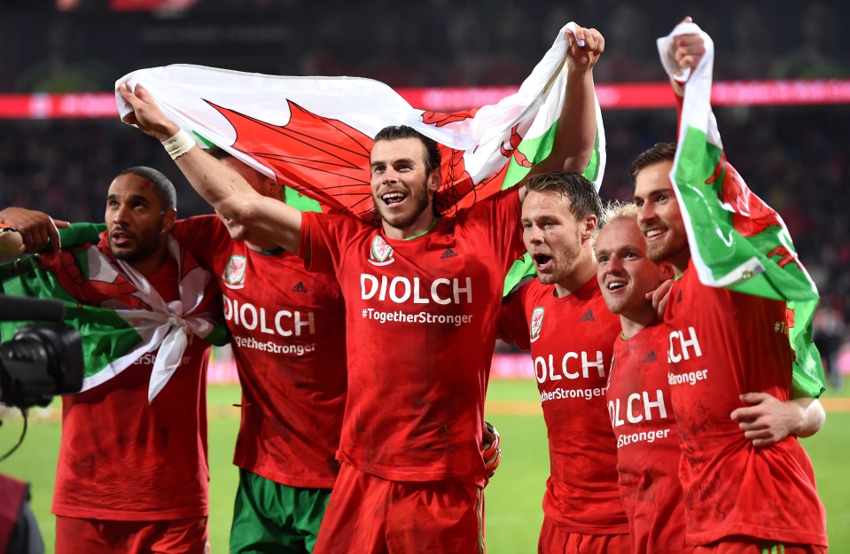  Wales players celebrate after they officially qualified for the tournament