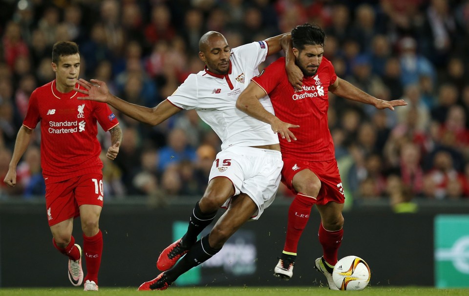  Steven N'Zonzi uses his strength against Emre Can during the Europa League final