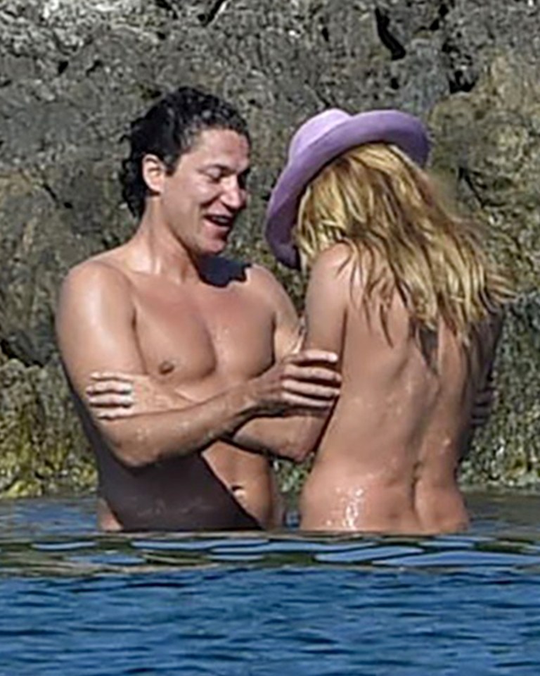  The cute couple shared a joke as they braved the chilly waters