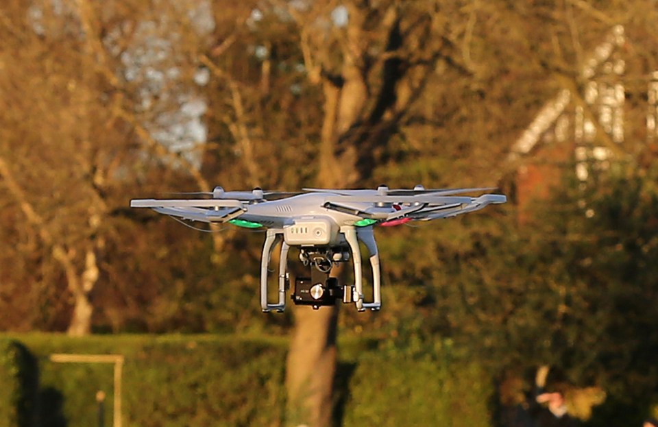 PIC SHOWS: A drone being used on private property of a rugby match at Tonbridge College. Their pics used for evaluation of moves on rugby pitch. 8.12.14