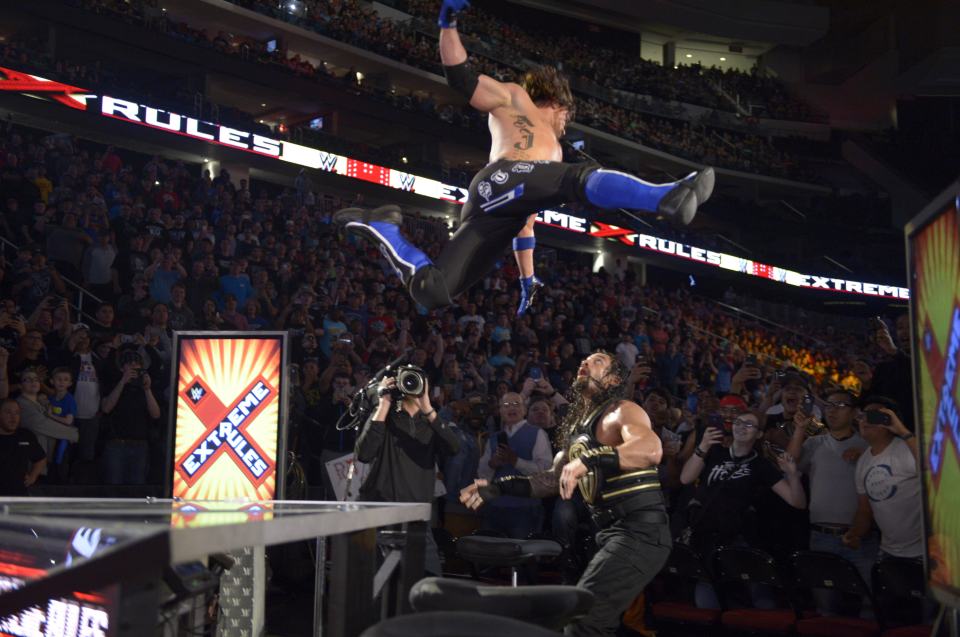  AJ Styles hits Roman Reigns with his trademark move the Phenomenal Forearm at Extreme Rules but the champion got up to defeat the challenger