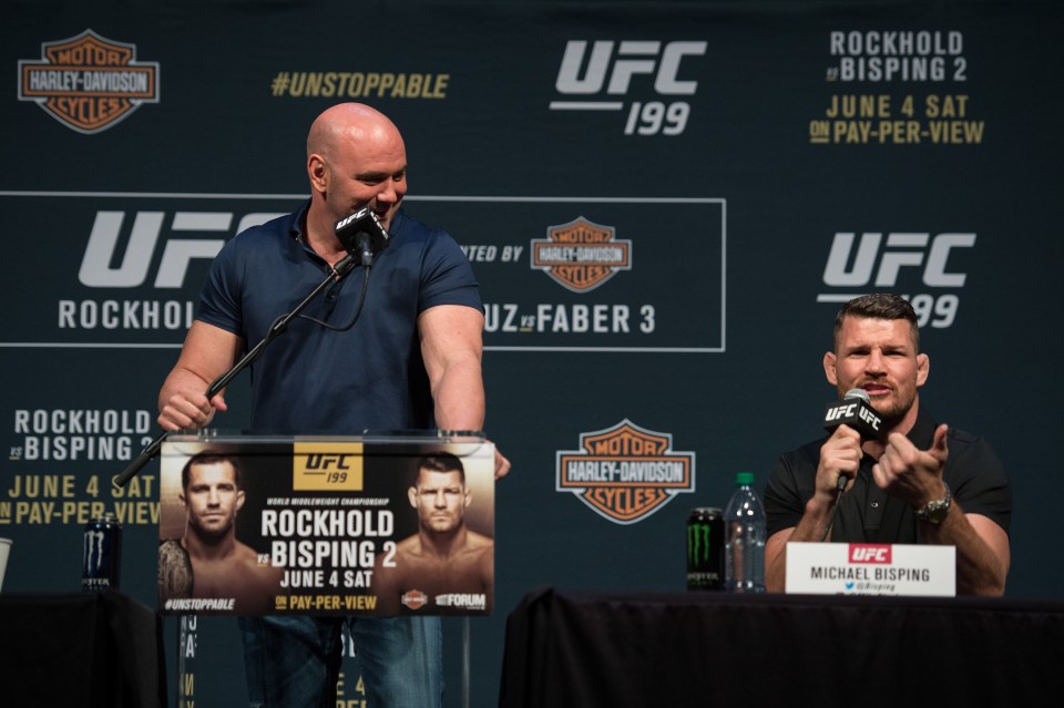  Michael Bisping holds court at the UFC 199 press conference as Dana White looks on