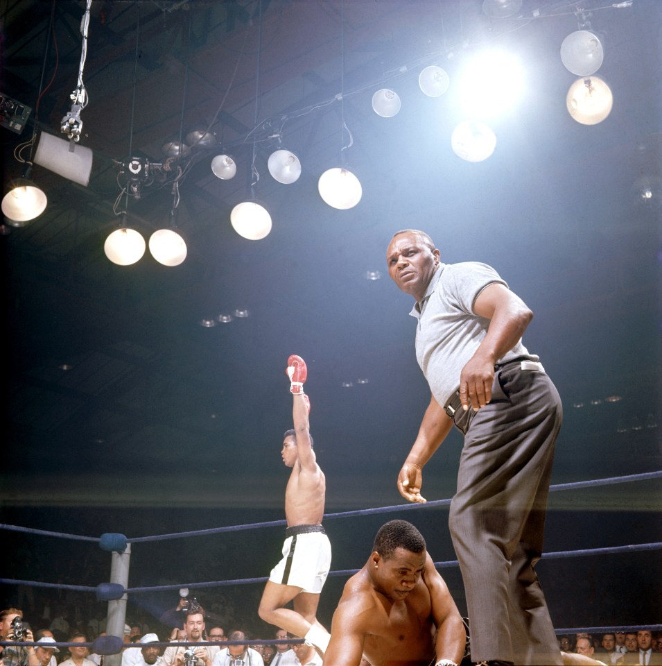  1965: Ali raises his fists in victory, while the ref stands over defeated Sonny Liston