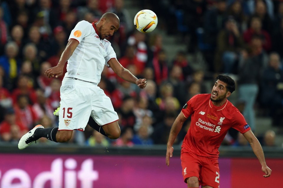  Sevilla's French midfielder Steven N'Zonzi heads the ball next to Liverpool's German midfielder Emre Can