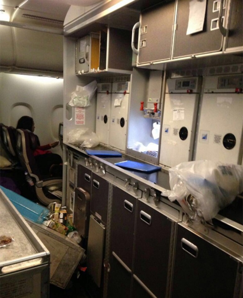  Photos shared on social media show carnage on board, with overturned food carts, baggage littering the aisles and cracks in overhead lockers