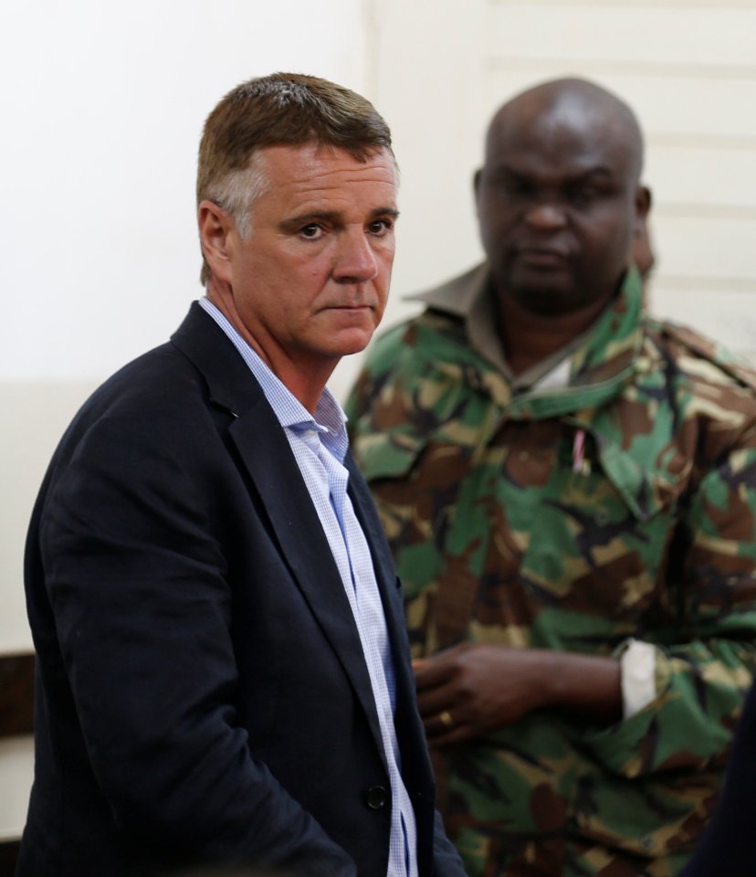  Alden, 53, arrested on suspicion of the murder, stands inside the dock at the Kibera Law Courts