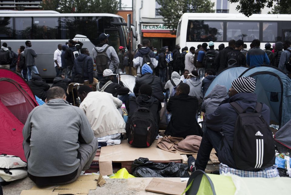  Migrants were dispersed to different areas including gyms after the area was cleared out by riot police