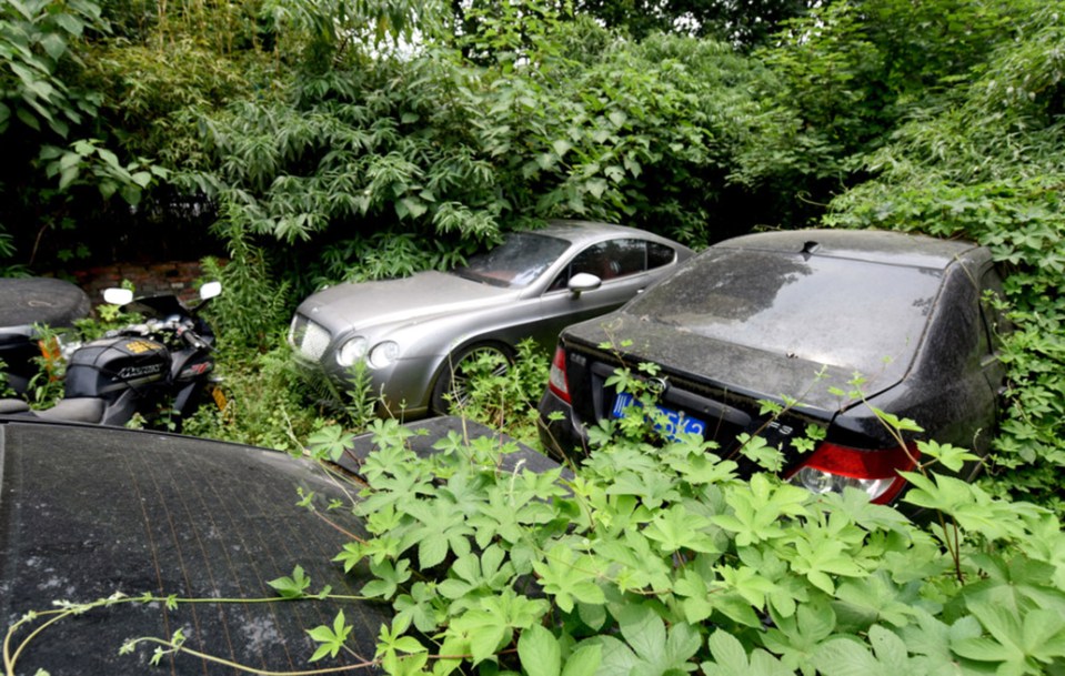  Other vehicles on the disused land include motorbikes and Sedans