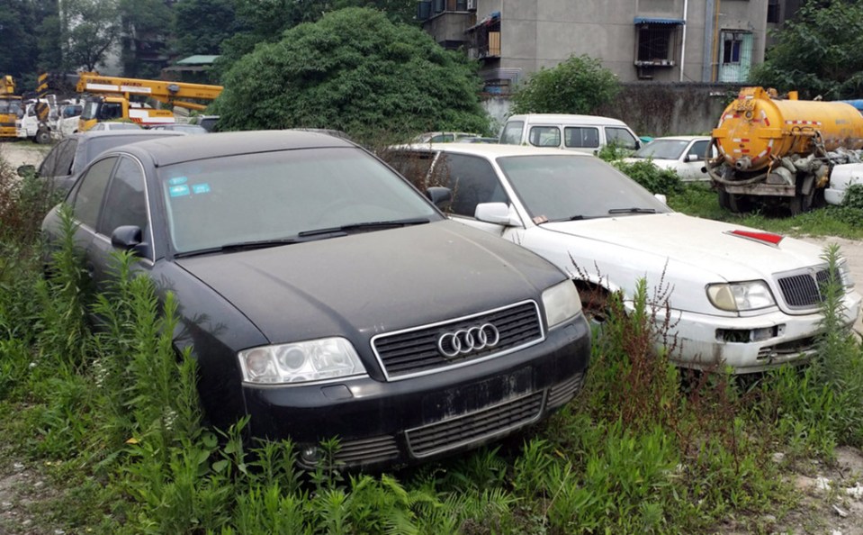  Dozens of luxury German cars including BMWs, Audis and Mercedes have been snapped in the former parking lot