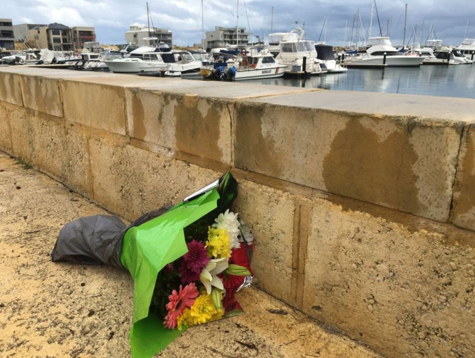  Flowers have been left at the beach where Ms Collyer lost her life