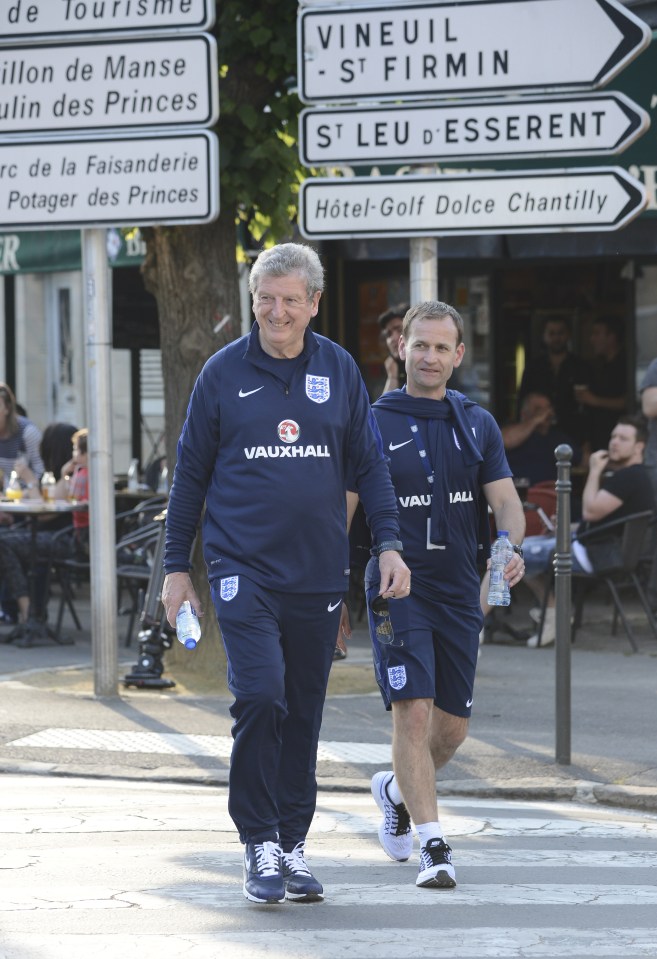  Roy Hodgson smiles as he lands in Chantilly, France, to begin preparations