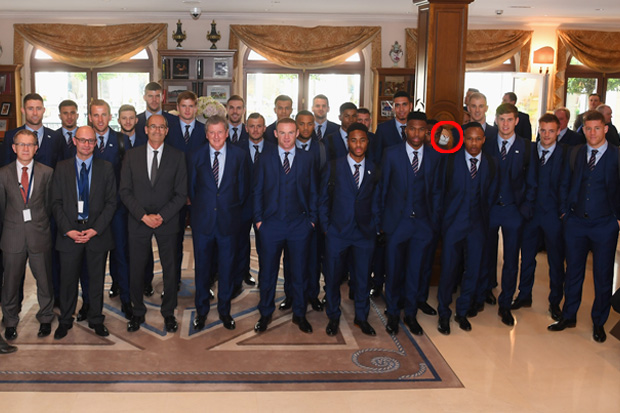  Chris Smalling sneaks the unnamed toy lion mascot into an England squad photo